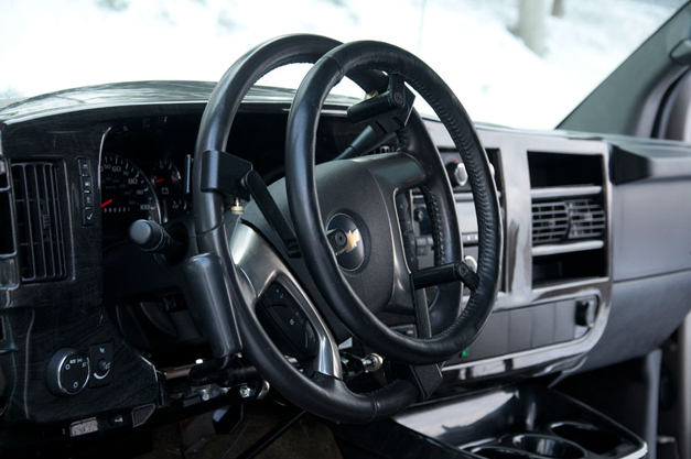 Are custom controls needed for a midget driving truck? Discover the adaptations for safe vehicle operation.